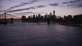 4K aerial stock footage Approaching Lower Manhattan, Manhattan Bridge, New York, New York, twilight Aerial Stock Footage | AX89_121