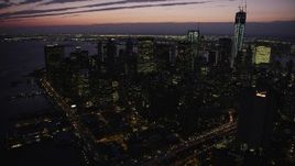 4K aerial stock footage Approaching Lower Manhattan skyscrapers, tilt down, New York, twilight Aerial Stock Footage | AX89_131