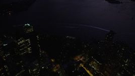 4K aerial stock footage Flying by Lower Manhattan, revealing New York Harbor, New York, twilight Aerial Stock Footage | AX89_135