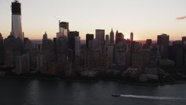 4K aerial stock footage Flying by Lower Manhattan skyline, New York, New York, sunrise Aerial Stock Footage | AX90_004