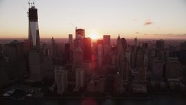 4K aerial stock footage Flying by Lower Manhattan skyscrapers, New York, New York, sunrise Aerial Stock Footage | AX90_010