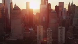 4K aerial stock footage Flying by Lower Manhattan, New York, New York, sunrise Aerial Stock Footage | AX90_024