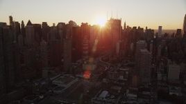 4K aerial stock footage Flying by Midtown Manhattan, New York, New York, sunrise Aerial Stock Footage | AX90_032