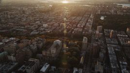 4K aerial stock footage of the Cathedral of Saint John the Divine, Morningside Heights, New York, sunrise Aerial Stock Footage | AX90_037