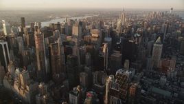 4K aerial stock footage Flying by Midtown Manhattan, New York, New York, sunrise Aerial Stock Footage | AX90_045