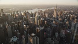 4K aerial stock footage Flying by Midtown Manhattan, Empire State Building, New York, sunrise Aerial Stock Footage | AX90_047