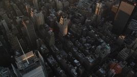 4K aerial stock footage Flying over Midtown Manhattan, reveal Empire State Building, New York, sunrise Aerial Stock Footage | AX90_048