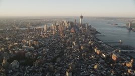4K aerial stock footage Approaching Lower Manhattan, New York, New York, sunrise Aerial Stock Footage | AX90_064