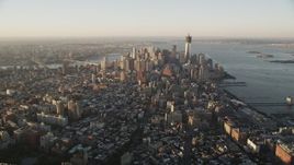 4K aerial stock footage Approaching Lower Manhattan, New York, New York, sunrise Aerial Stock Footage | AX90_065