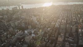 4K aerial stock footage Panning across East Village, revealing Midtown Manhattan, New York, sunrise Aerial Stock Footage | AX90_066