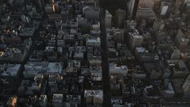 4K aerial stock footage of 5th Avenue, reveal Empire State Building, Midtown Manhattan, New York, sunrise Aerial Stock Footage | AX90_067