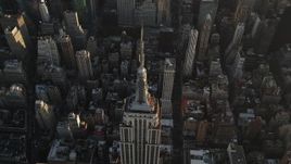 4K aerial stock footage of a Bird's eye view over Empire State Building, New York, New York, sunrise Aerial Stock Footage | AX90_072