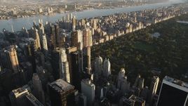 4K aerial stock footage Flying by Midtown Manhattan skyscraper, New York, New York, sunrise Aerial Stock Footage | AX90_077