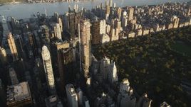 4K aerial stock footage Flying by Midtown Manhattan skyscraper, New York, New York, sunrise Aerial Stock Footage | AX90_078