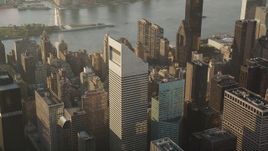 4K aerial stock footage Flying by Citigroup Center in Midtown Manhattan, New York, New York, sunrise Aerial Stock Footage | AX90_083