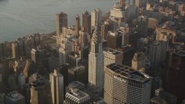 4K aerial stock footage Flying by Chrysler Building, Midtown Manhattan, New York, New York, sunrise Aerial Stock Footage | AX90_085