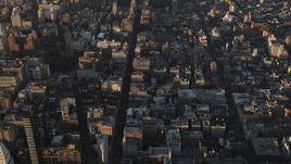 4K aerial stock footage Flying over Chelsea, revealing Lower Manhattan, New York, New York, sunrise Aerial Stock Footage | AX90_089