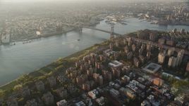 4K aerial stock footage Approaching Williamsburg Bridge, Lower East Side, New York, sunrise Aerial Stock Footage | AX90_092