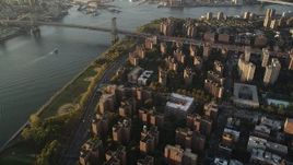 4K aerial stock footage of Public housing, Lower East Side, Williamsburg Bridge, New York, sunrise Aerial Stock Footage | AX90_093