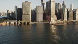 4K aerial stock footage Tilting up to Lower Manhattan skyline, New York, New York, sunrise Aerial Stock Footage | AX90_113