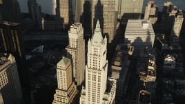 4K aerial stock footage Orbiting Woolworth Building, Lower Manhattan, New York, New York, sunrise Aerial Stock Footage | AX90_119