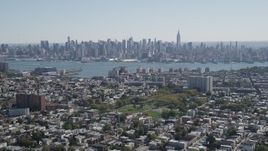 4K aerial stock footage of the Midtown Manhattan skyline and Hudson River, New York, seen from Union City, New Jersey Aerial Stock Footage | AX91_001