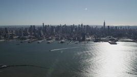 4K aerial stock footage of flying by Midtown Manhattan and Hudson River, seen from Union City, New Jersey Aerial Stock Footage | AX91_005