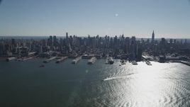 4K aerial stock footage of passing by Midtown Manhattan skyline, seen from Hudson River, New York, New York Aerial Stock Footage | AX91_006