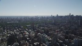 4K aerial stock footage of passing by Upper West Side apartment buildings, New York, New York Aerial Stock Footage | AX91_009