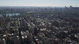 4K aerial stock footage of passing by Upper West Side apartment buildings, New York, New York Aerial Stock Footage | AX91_010