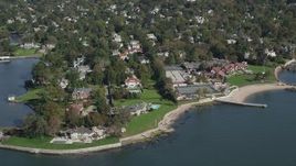 4K aerial stock footage of flying by oceanfront mansions in Larchmont, New York Aerial Stock Footage | AX91_034