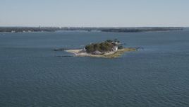 4K aerial stock footage video of approaching an oceanfront, island home, Island Beach, Connecticut Aerial Stock Footage | AX91_059