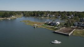 4K aerial stock footage of tilting up to reveal oceanfront homes, Greenwich, Connecticut Aerial Stock Footage | AX91_066