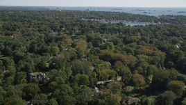 4K aerial stock footage of flying over mansions and trees, Norwalk, Connecticut Aerial Stock Footage | AX91_088