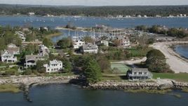 4K aerial stock footage of flying by beachfront homes and marina in Westport, Connecticut Aerial Stock Footage | AX91_102