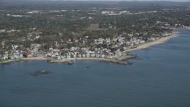 4K aerial stock footage of flying by neighborhoods near the beach in Milford, Connecticut Aerial Stock Footage | AX91_130