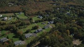 4K aerial stock footage approach neighborhoods near forests in autumn, Guilford, Connecticut Aerial Stock Footage | AX91_184