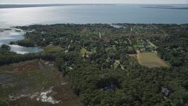 4K aerial stock footage of approaching upscale homes on the coast in Southold, New York Aerial Stock Footage | AX91_201