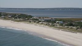 4K aerial stock footage of flying by beachfront mansions, Southampton, New York Aerial Stock Footage | AX91_220