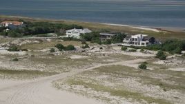4K aerial stock footage of flying by three beachside mansions, Southampton, New York Aerial Stock Footage | AX91_228