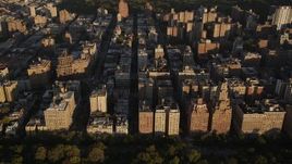 4K aerial stock footage Flying by apartment buildings, Upper West Side, New York, New York, sunset Aerial Stock Footage | AX93_016
