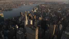 4K aerial stock footage Flying by Chrysler Building, Midtown Manhattan, New York, New York, sunset Aerial Stock Footage | AX93_031