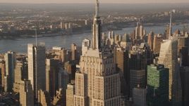 4K aerial stock footage Flying by the Empire State Building, Midtown Manhattan, New York, sunset Aerial Stock Footage | AX93_040