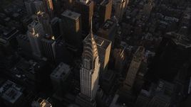 4K aerial stock footage Flying by the Chrysler Building, Midtown Manhattan, New York, New York, sunset Aerial Stock Footage | AX93_049