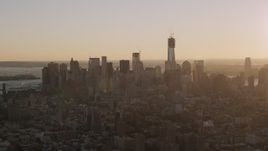 4K aerial stock footage Flying by Lower Manhattan skyline, New York, New York, sunset Aerial Stock Footage | AX93_056