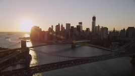4K aerial stock footage Manhattan Bridge, approach Brooklyn Bridge, Lower Manhattan, New York, sunset Aerial Stock Footage | AX93_064