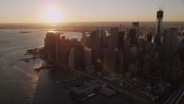 4K aerial stock footage Approaching Lower Manhattan, East River, New York, New York, sunset Aerial Stock Footage | AX93_067