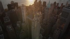 4K aerial stock footage of 70 Pine Street, 40 Wall Street,  60 Wall Street, Lower Manhattan, New York, sunset Aerial Stock Footage | AX93_070