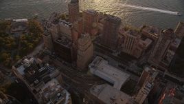 4K aerial stock footage Approaching skyscrapers, Hudson River, Lower Manhattan, New York, sunset Aerial Stock Footage | AX93_072