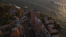4K aerial stock footage Orbiting skyscrapers, West Street, Lower Manhattan, New York, New York, sunset Aerial Stock Footage | AX93_073